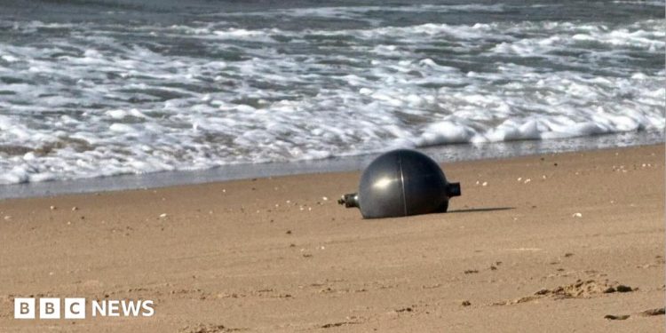 Australia probes mystery space balls that washed up on beach