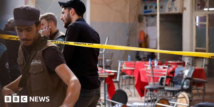 Bomb blast at central Damascus cafe kills six, state media say