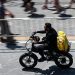 Heatwave prompts Italy's delivery riders to strike for extra rights