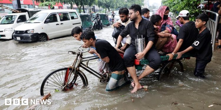 Heavy rain and flash floods in Bangladesh kill at least 50