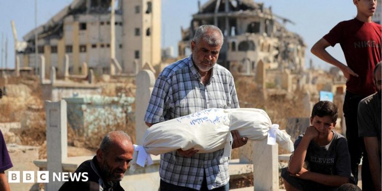 Israeli strikes in Gaza kill 12, including family of six, medics say