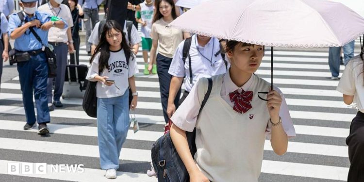 Japan temperatures soar over 40C, marking first 'cruelly hot day' Japan temperatures soar over 40C, marking first 'cruelly hot day'
