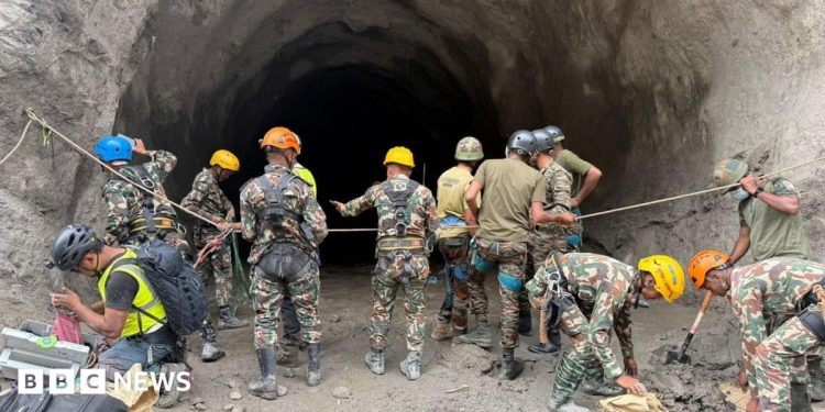 Nepal rescuers blast hillside in search of hydropower workers as families wait anxiously