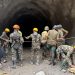 Nepal rescuers blast hillside in search of hydropower workers as families wait anxiously