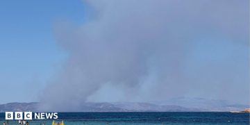 Two dead and hundreds evacuated as wildfires break out near Athens Two dead and hundreds evacuated as wildfires break out near Athens