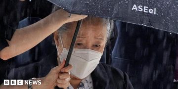 Unification Church: 'Moonies' church leader jailed for two years over bribery offences