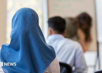 Austria's Islamic headscarf ban in force as under-14s go back to school