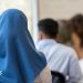 Austria's Islamic headscarf ban in force as under-14s go back to school