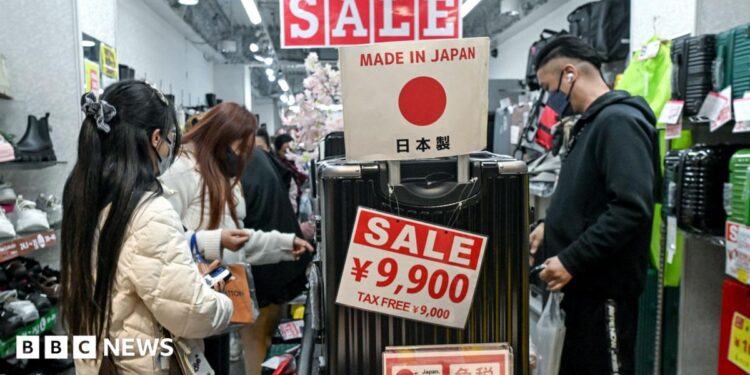 Japan raises interest rate to new 31-year high to curb rising prices Japan raises interest rate to new 31-year high to curb rising prices