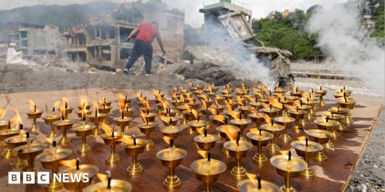 Nepal holds national day of mourning for victims of flash flood disaster