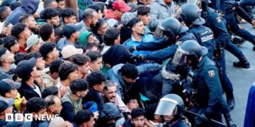 Police begin operation to move migrants from Ceuta beaches